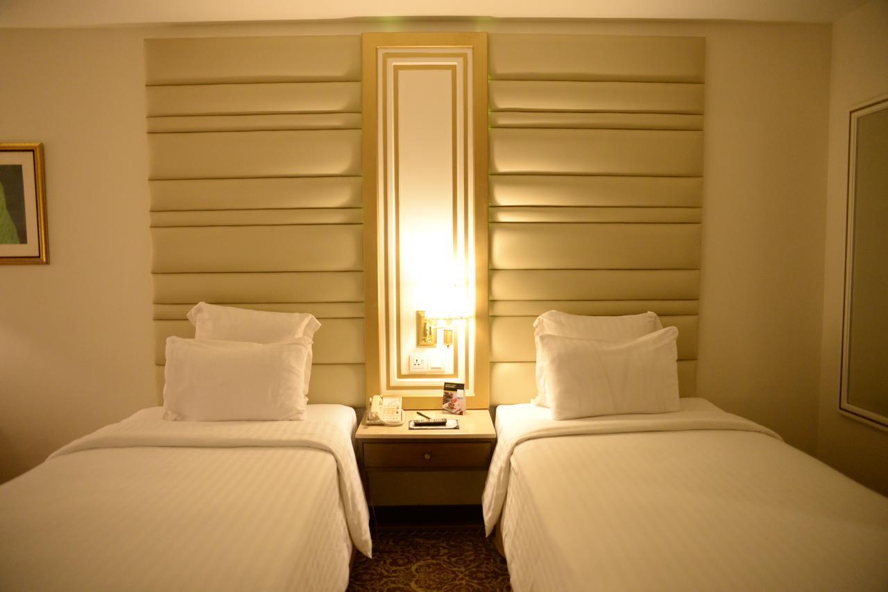 Pearl Continental Hotel, Карачи Экстерьер фото A room at the hotel