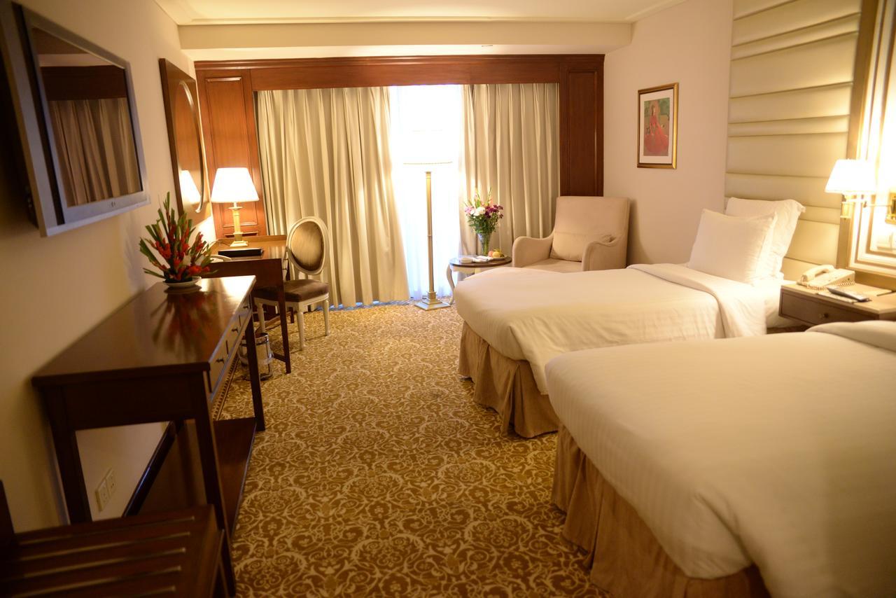 Pearl Continental Hotel, Карачи Экстерьер фото A room at the hotel